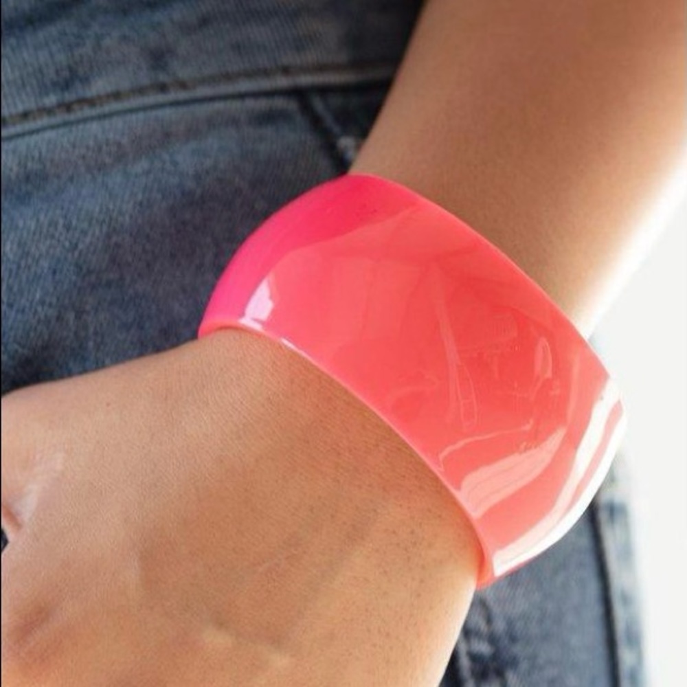 NEW WITH TAGS - A neon pink cuff bracelet.